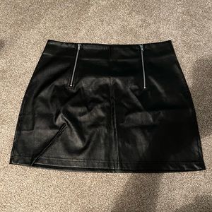 Leather mini skirt with zipper accents